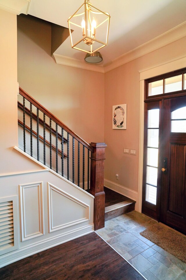 450 Lowe Branch Rd, Centerville, TN 37033 - foyer entrance featuring a chandelier, stairway, wood finished floors, and crown molding