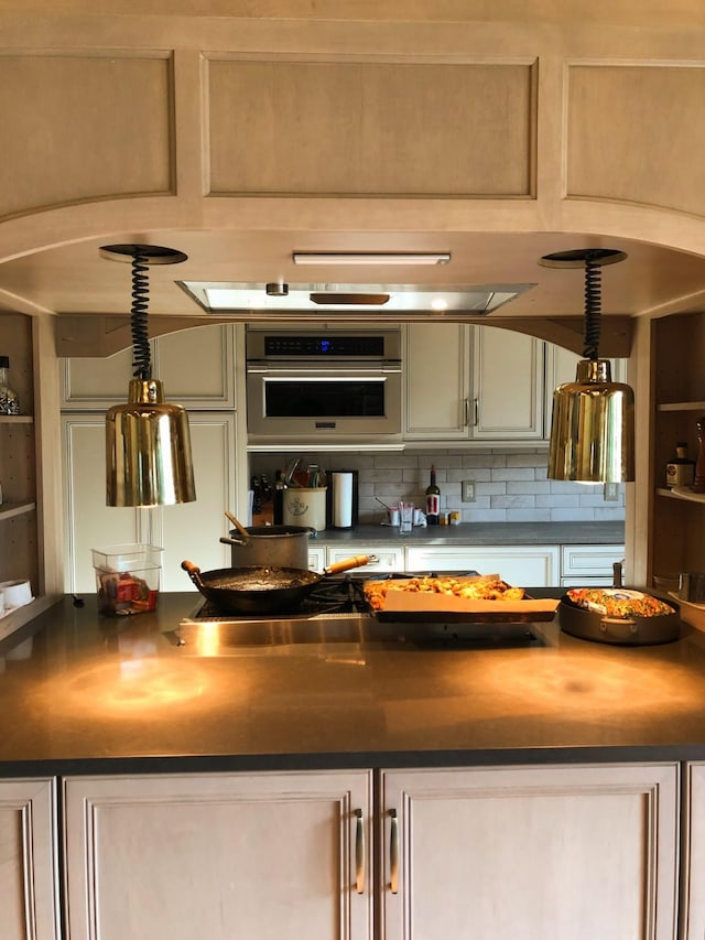 450 Lowe Branch Rd, Centerville, TN 37033 - kitchen with stainless steel oven and tasteful backsplash