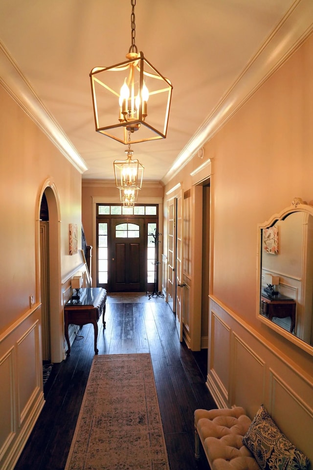 450 Lowe Branch Rd, Centerville, TN 37033 - foyer entrance featuring a chandelier, ornamental molding, dark wood-type flooring, a decorative wall, and wainscoting