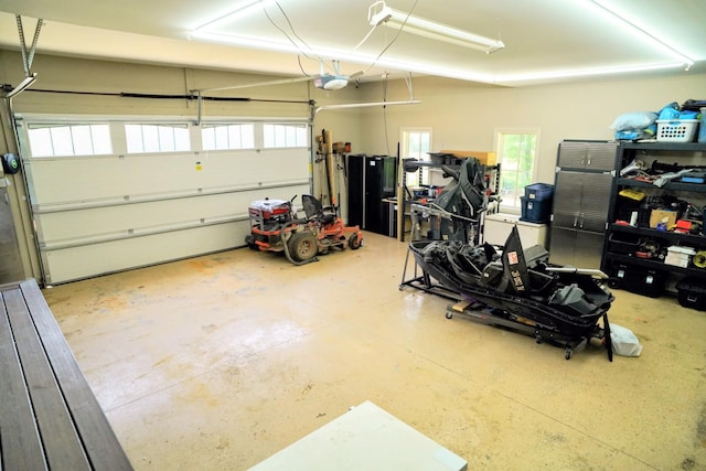 450 Lowe Branch Rd, Centerville, TN 37033 - garage featuring a garage door opener