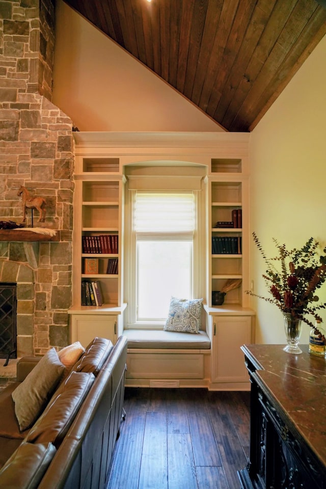 450 Lowe Branch Rd, Centerville, TN 37033 - sitting room featuring lofted ceiling, wood ceiling, built in features, dark wood-type flooring, and a fireplace