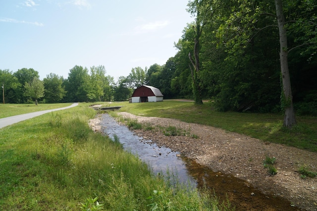 450 Lowe Branch Rd, Centerville, TN 37033 - view of road with a barn and a forest view