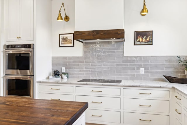 1249 Wilson School Rd, Chapel Hill, TN 37034 - kitchen featuring double oven, black electric cooktop, white cabinetry, and decorative backsplash