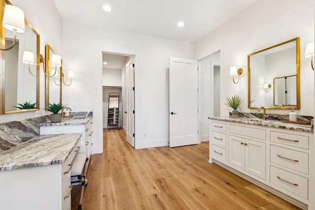 1249 Wilson School Rd, Chapel Hill, TN 37034 - full bath with wood finished floors, two vanities, and recessed lighting