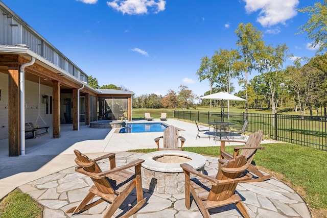 1249 Wilson School Rd, Chapel Hill, TN 37034 - view of pool with an outdoor fire pit, a sunroom, a patio, and a pool with connected hot tub