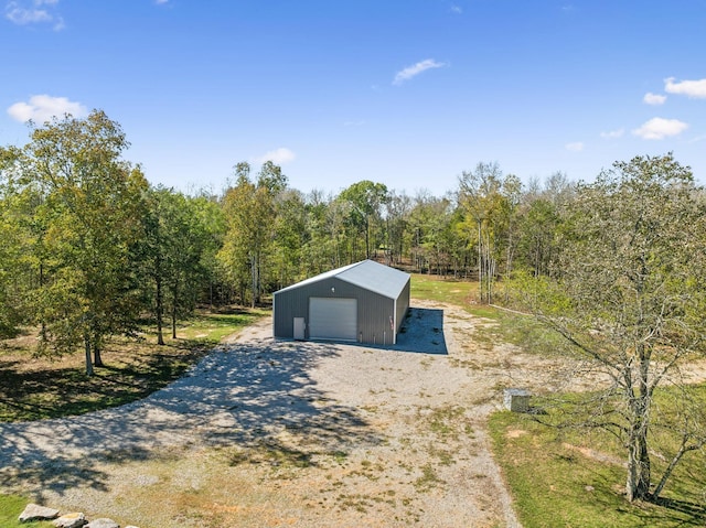 1249 Wilson School Rd, Chapel Hill, TN 37034 - detached garage featuring gravel driveway and a view of trees