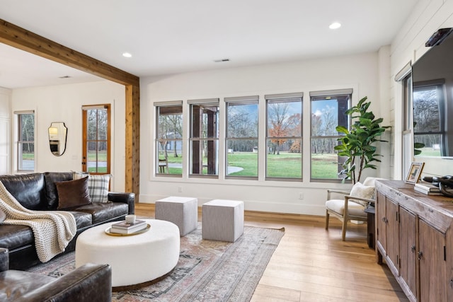 1249 Wilson School Rd, Chapel Hill, TN 37034 - living room with light wood finished floors, recessed lighting, and beam ceiling