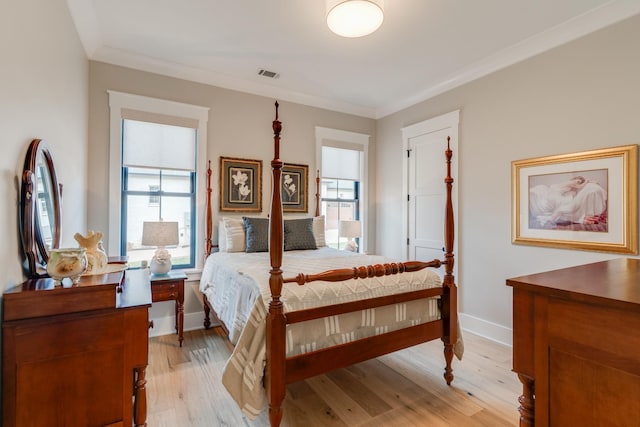 1036 Wilderness Way, Cottontown, TN 37048 - bedroom featuring crown molding and light wood-type flooring