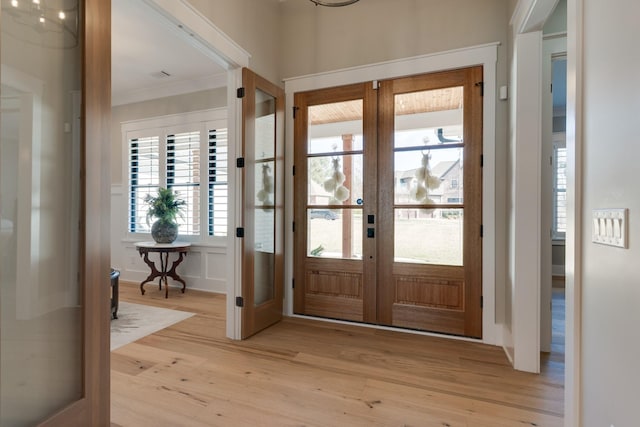 1036 Wilderness Way, Cottontown, TN 37048 - foyer with french doors, light wood-type flooring, and ornamental molding