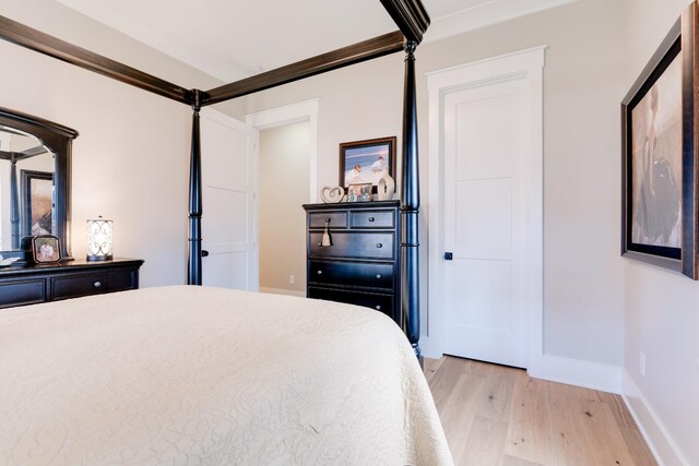 1036 Wilderness Way, Cottontown, TN 37048 - bedroom with light wood-style flooring and crown molding