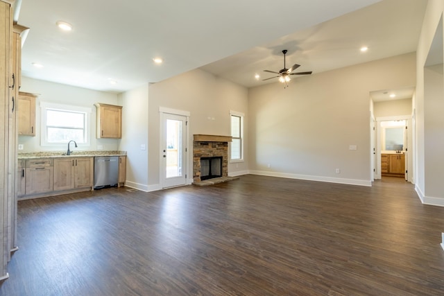 1189 Goose Dr, Springfield, TN 37172 - unfurnished living room featuring a ceiling fan, dark wood-style flooring, a fireplace, and recessed lighting