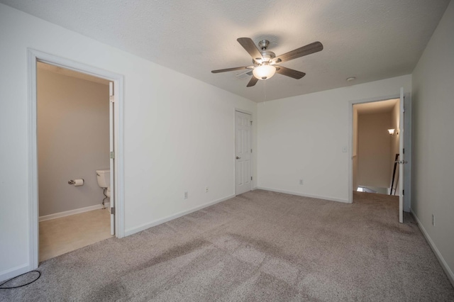 482 Flintlock Ct, Nashville, TN 37217 - unfurnished bedroom featuring carpet, a ceiling fan, and a textured ceiling