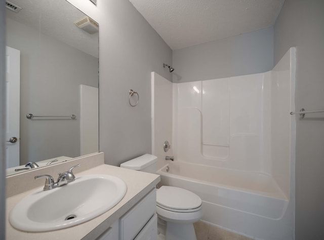 482 Flintlock Ct, Nashville, TN 37217 - bathroom with a textured ceiling, vanity, bathing tub / shower combination, and tile patterned floors