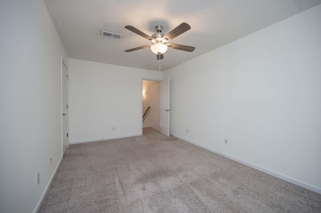 482 Flintlock Ct, Nashville, TN 37217 - unfurnished room featuring light colored carpet, ceiling fan, and a textured ceiling