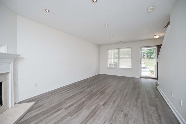 482 Flintlock Ct, Nashville, TN 37217 - unfurnished living room featuring wood finished floors and a fireplace