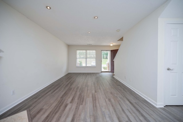 482 Flintlock Ct, Nashville, TN 37217 - unfurnished living room featuring wood finished floors and recessed lighting