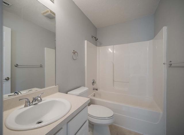 482 Flintlock Ct, Nashville, TN 37217 - full bathroom with a textured ceiling, vanity, shower / bathtub combination, and tile patterned flooring