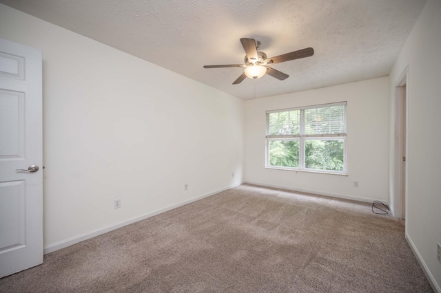 482 Flintlock Ct, Nashville, TN 37217 - carpeted spare room with a ceiling fan and a textured ceiling