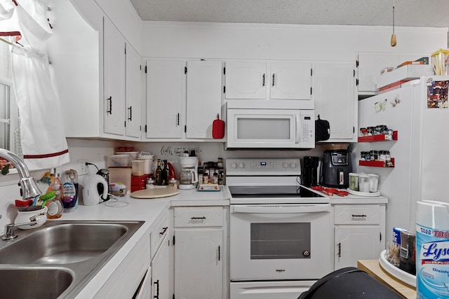 460 E Georgia Ave, Whitwell, TN 37397 - kitchen featuring white appliances, white cabinets, light countertops, and a textured ceiling