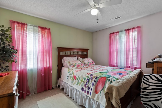 460 E Georgia Ave, Whitwell, TN 37397 - bedroom featuring carpet flooring, a textured ceiling, and a ceiling fan