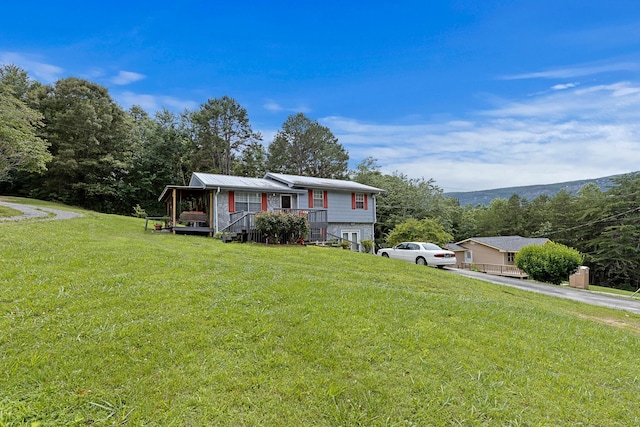460 E Georgia Ave, Whitwell, TN 37397 - view of front of home with a front yard and driveway