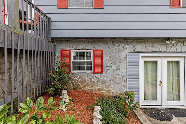 460 E Georgia Ave, Whitwell, TN 37397 - view of home's exterior with stone siding and french doors