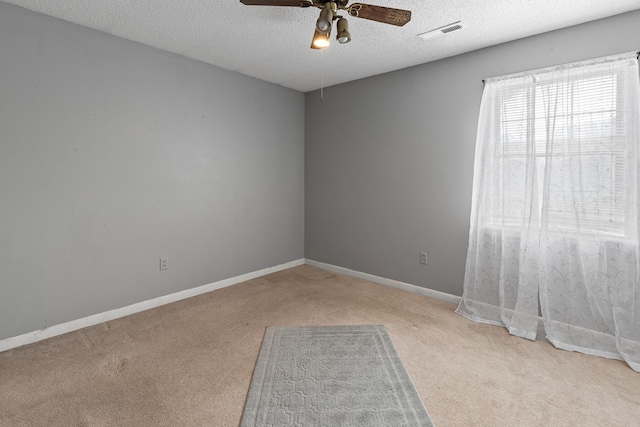 460 E Georgia Ave, Whitwell, TN 37397 - empty room featuring carpet, a ceiling fan, and a textured ceiling