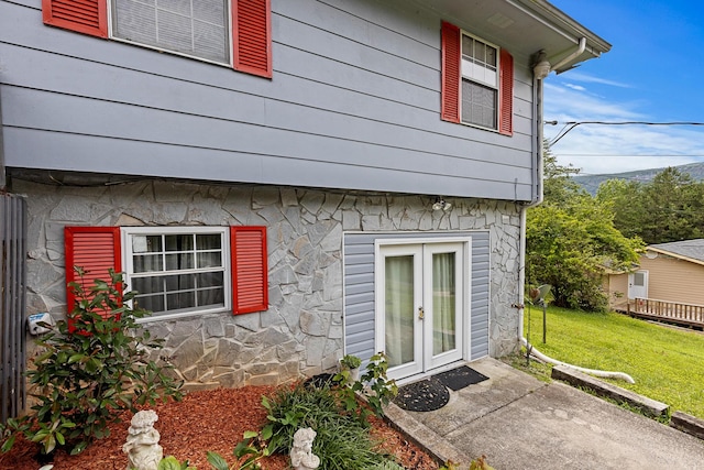 460 E Georgia Ave, Whitwell, TN 37397 - entrance to property featuring stone siding, french doors, and a yard