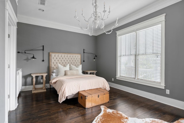 1711 Sevier St, Nashville, TN 37206 - bedroom featuring multiple windows, ornamental molding, wood finished floors, and a chandelier