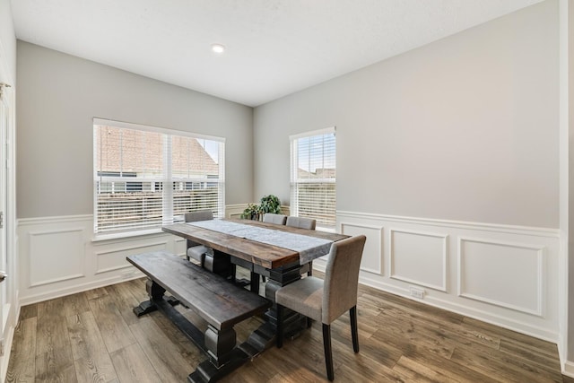 2122 Oak Dr, Murfreesboro, TN 37128 - dining area with wainscoting, wood finished floors, a decorative wall, and recessed lighting