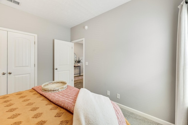 2122 Oak Dr, Murfreesboro, TN 37128 - bedroom with carpet floors and a closet
