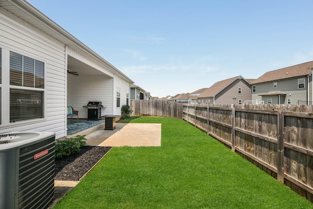 2122 Oak Dr, Murfreesboro, TN 37128 - fenced backyard featuring a patio, a ceiling fan, and a residential view