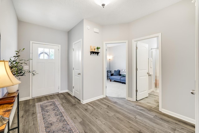 2122 Oak Dr, Murfreesboro, TN 37128 - entrance foyer featuring light wood finished floors and a textured ceiling
