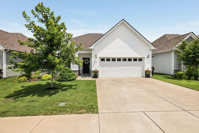 2122 Oak Dr, Murfreesboro, TN 37128 - view of front of property featuring a garage, driveway, and a front lawn