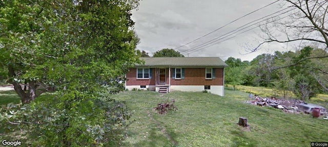 2968 Howard Bridge Rd, Columbia, TN 38401 - rear view of property with a lawn