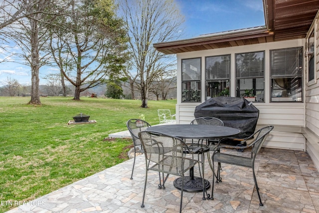 311 E Chestnut Hill Rd, Townsend, TN 37882 - view of patio / terrace with an outdoor fire pit, outdoor dining space, and area for grilling