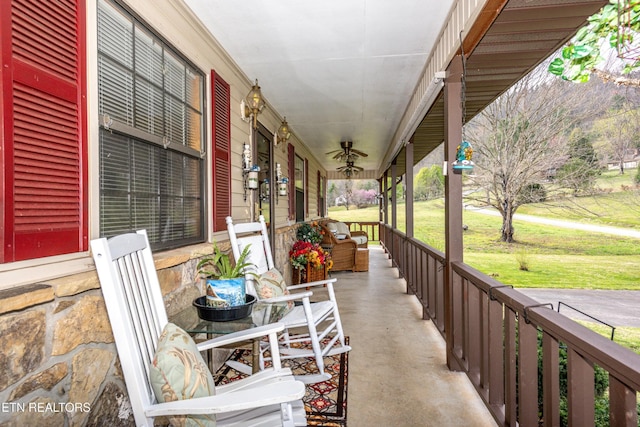 311 E Chestnut Hill Rd, Townsend, TN 37882 - porch featuring a lawn and a ceiling fan