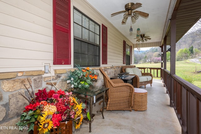 311 E Chestnut Hill Rd, Townsend, TN 37882 - porch featuring a ceiling fan and a lawn