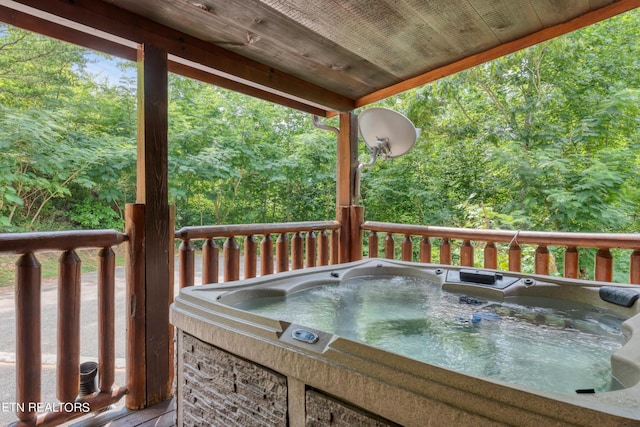 1615 Mountain Dreams Way, Sevierville, TN 37862 - wooden terrace with a hot tub