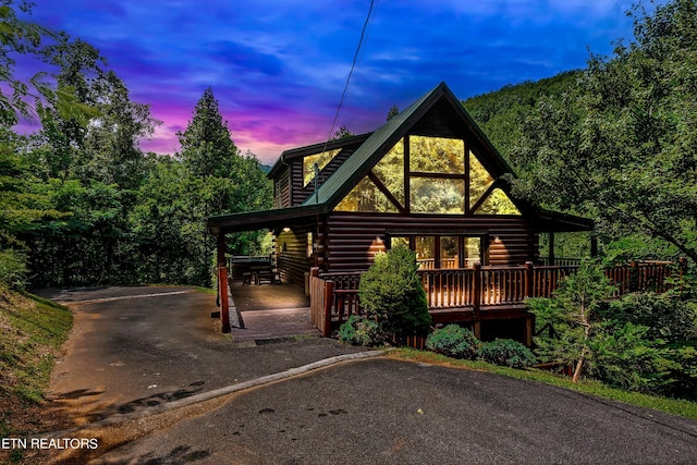 1615 Mountain Dreams Way, Sevierville, TN 37862 - log-style house featuring log exterior and a deck