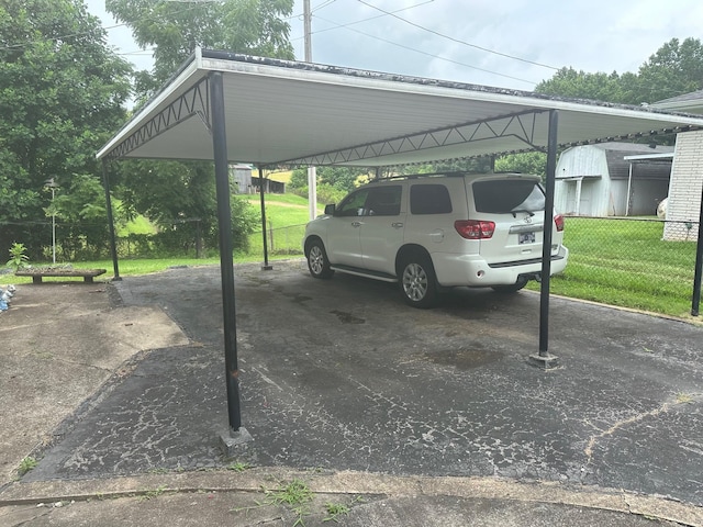233 Flat Ridge Rd, Goodlettsville, TN 37072 - view of parking with a carport