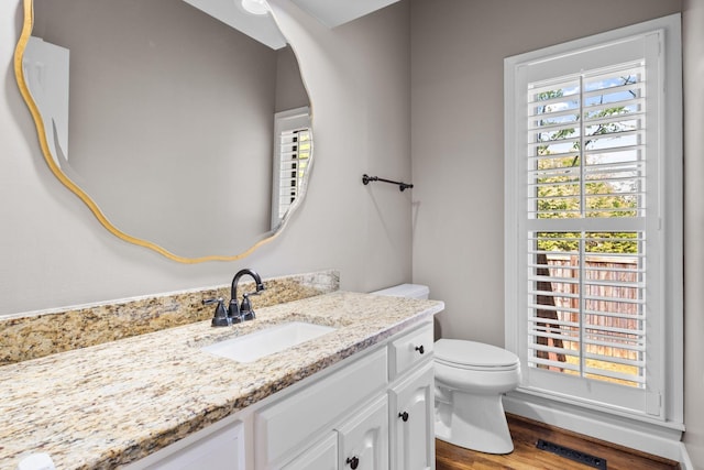 4253 Jamesborough Pl, Nashville, TN 37215 - half bathroom featuring vanity and wood finished floors