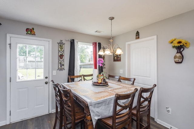 733 Hollandale Rd, La Vergne, TN 37086 - dining room with a chandelier and dark wood-style flooring