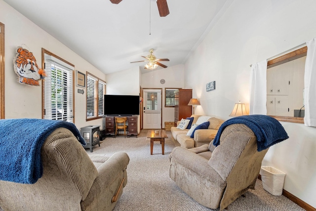 1795 Lake Logan Rd, Ardmore, TN 38449 - carpeted living room with ceiling fan, lofted ceiling, and a wood stove