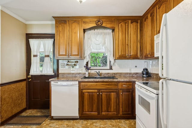 7180 Elrod Rd, Fairview, TN 37062 - kitchen with white appliances, crown molding, tasteful backsplash, and brown cabinets