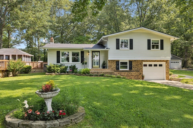 7180 Elrod Rd, Fairview, TN 37062 - tri-level home featuring a chimney, a front lawn, concrete driveway, brick siding, and a garage