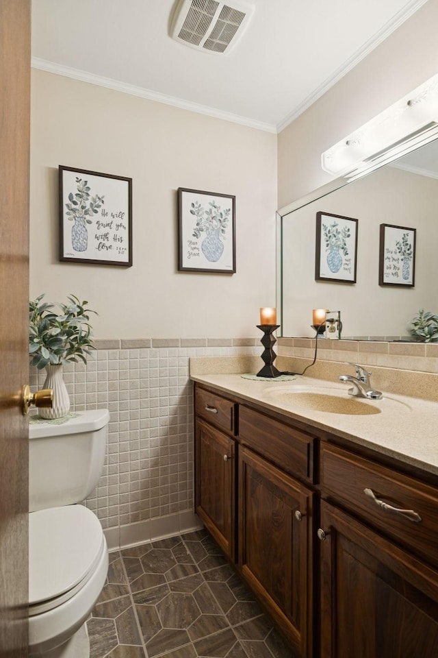 7180 Elrod Rd, Fairview, TN 37062 - half bathroom with vanity, crown molding, tile walls, and a wainscoted wall