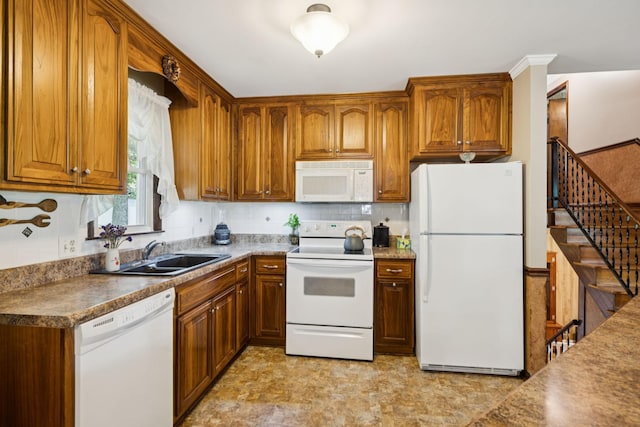 7180 Elrod Rd, Fairview, TN 37062 - kitchen with white appliances, brown cabinetry, and tasteful backsplash