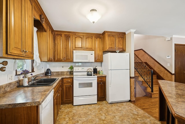 7180 Elrod Rd, Fairview, TN 37062 - kitchen with white appliances, brown cabinets, and dark countertops