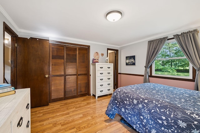 7180 Elrod Rd, Fairview, TN 37062 - bedroom with ornamental molding, light wood-style flooring, and a closet